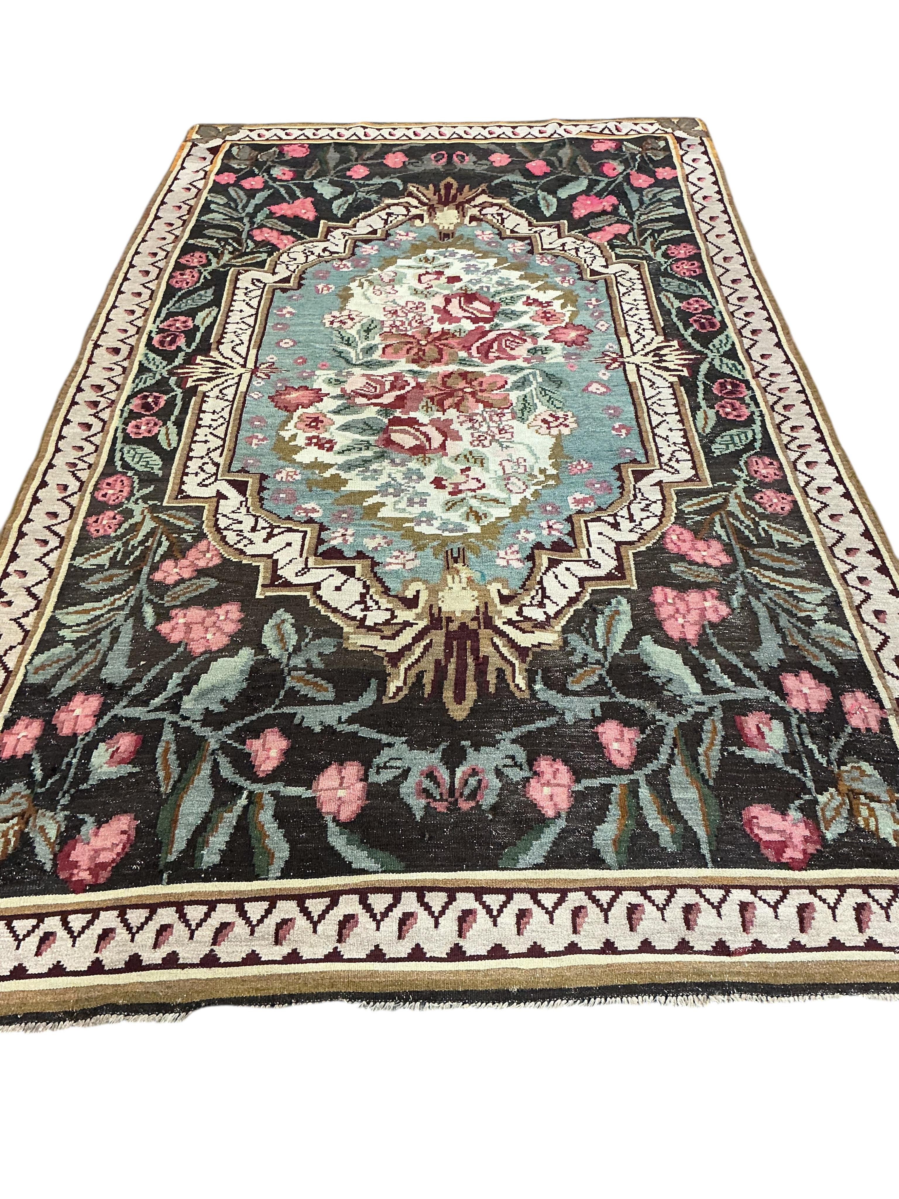 A Moldovan rose Kilim carpet, 330 x 194cm